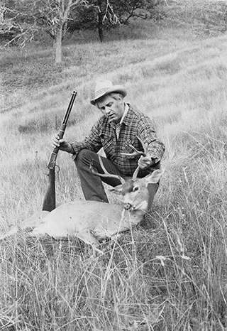 Author with the black-tailed buck he took with the Model ’92 carbine in 44 WCF.